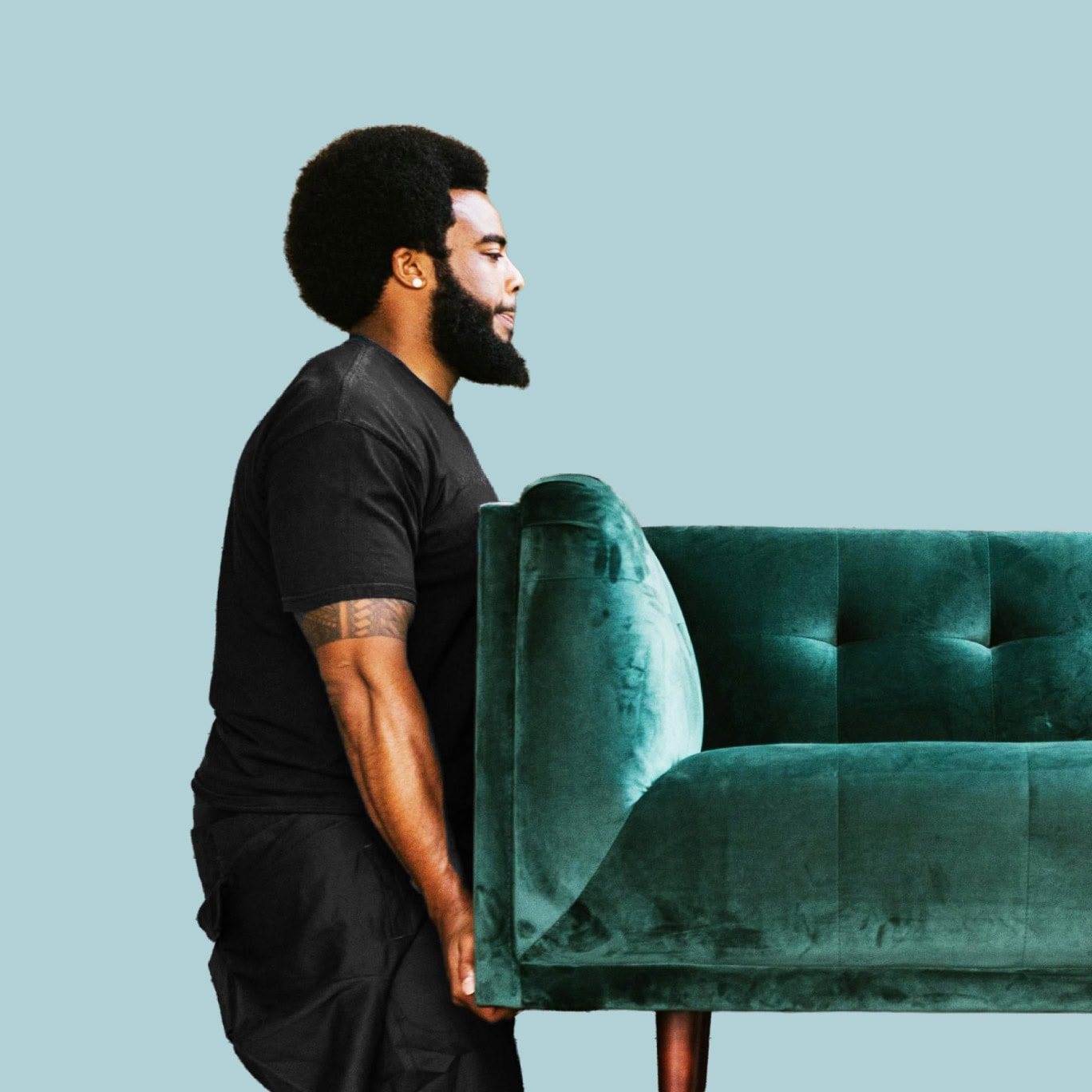 Elegant velvet green sofa with modern design by Sklar Furnishings, perfect for sophisticated living rooms.