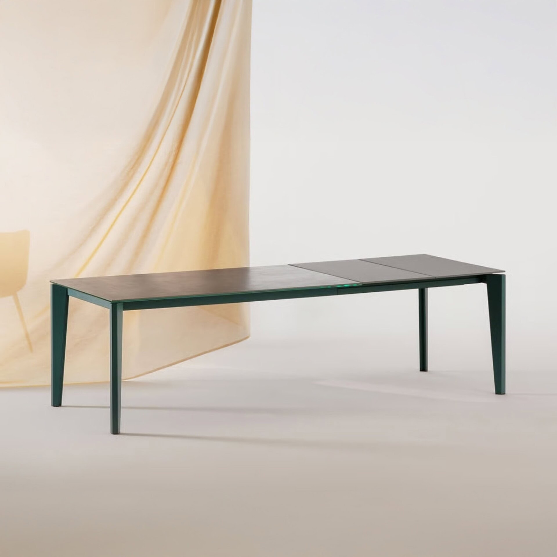 Side angle of the Diamond Extendable Dining Table highlighting its slim, elegant frame.