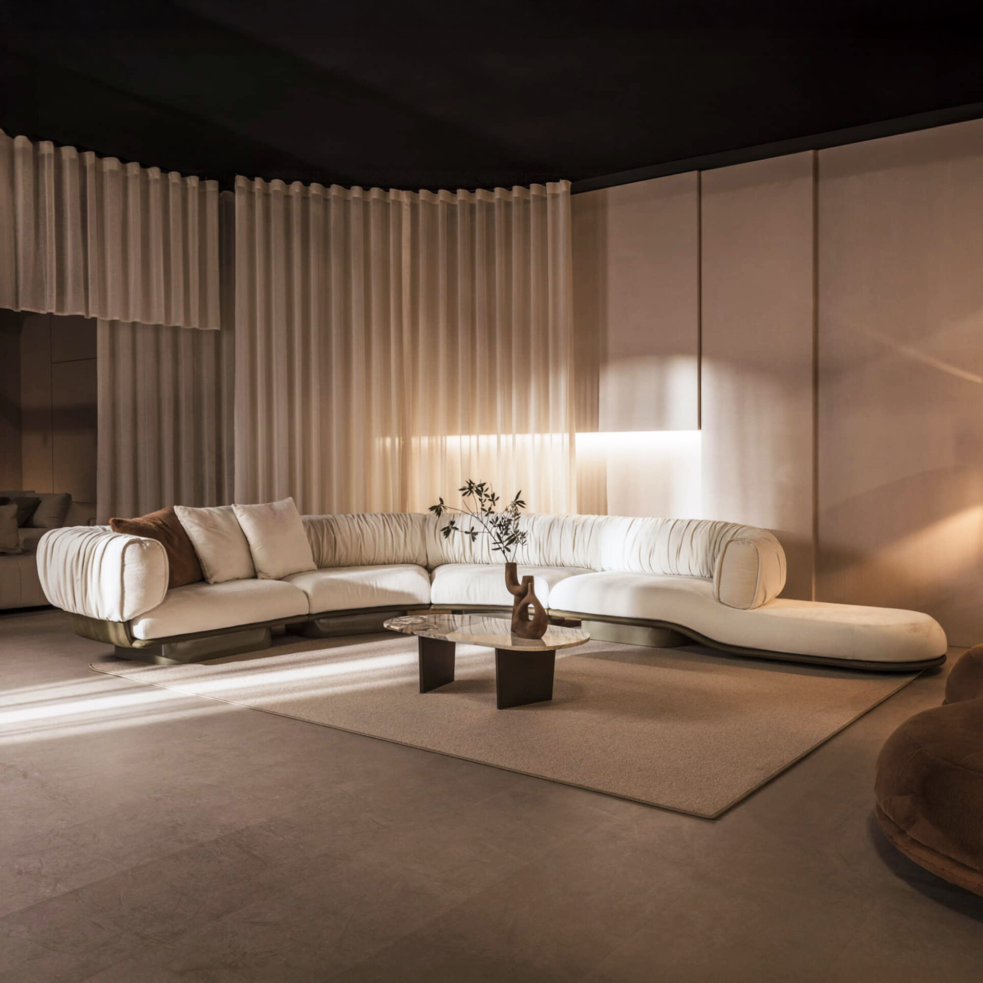 Break Modular Sofa by Nicoline in modern living room setting with curved sectional layout.