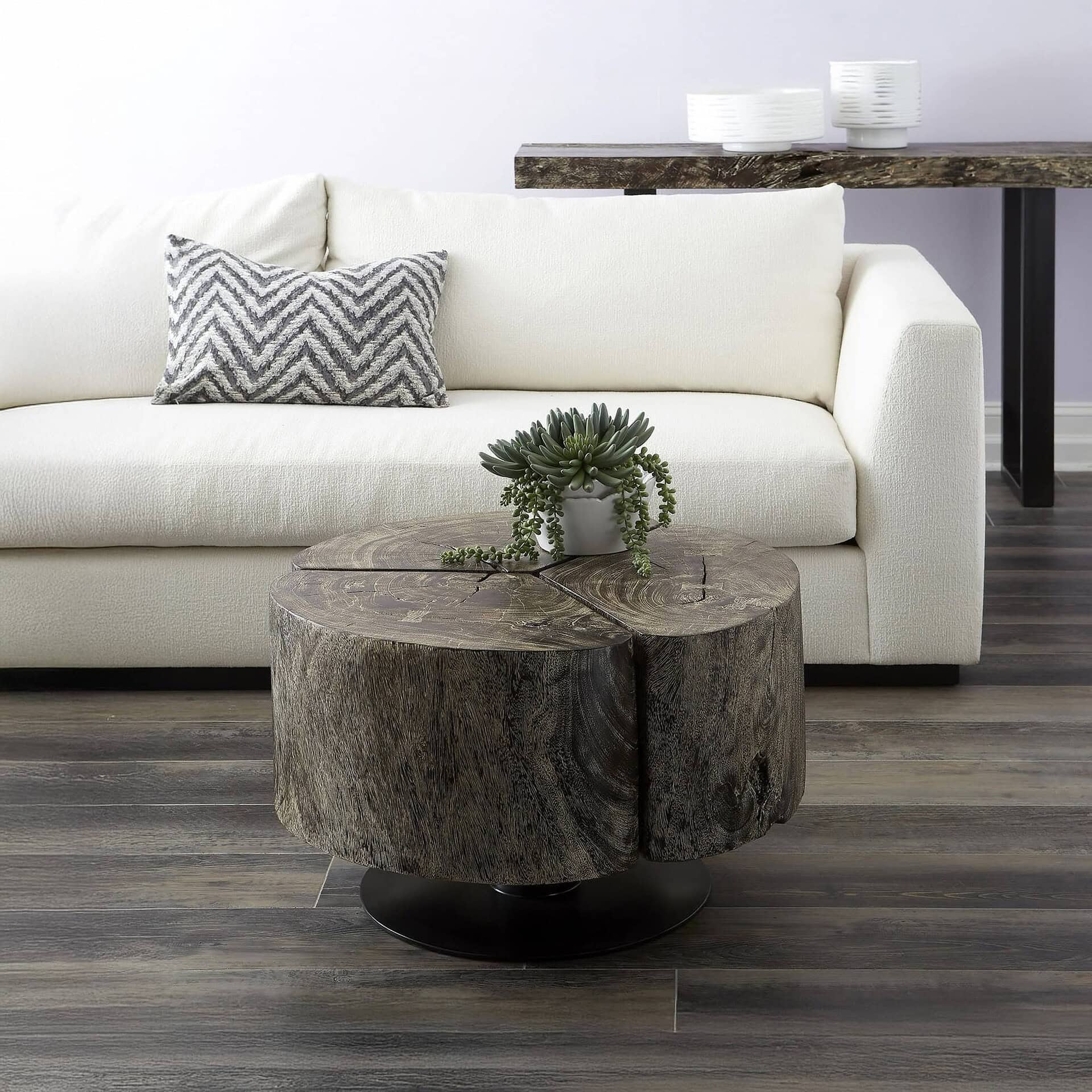 Clover Coffee Table styled in a bright living room with sofa and accent pillows.