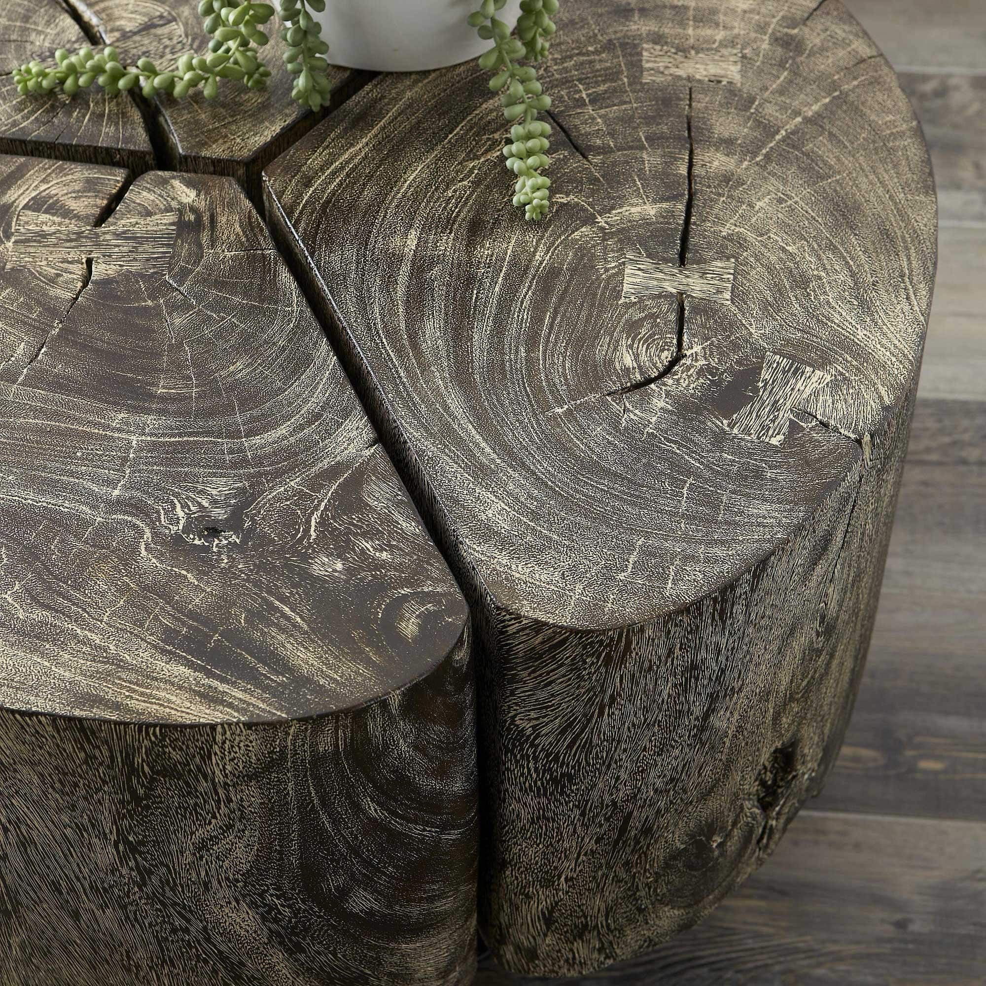 Close-up of Clover Coffee Table in gray stone finish showing wood grain texture and detail.