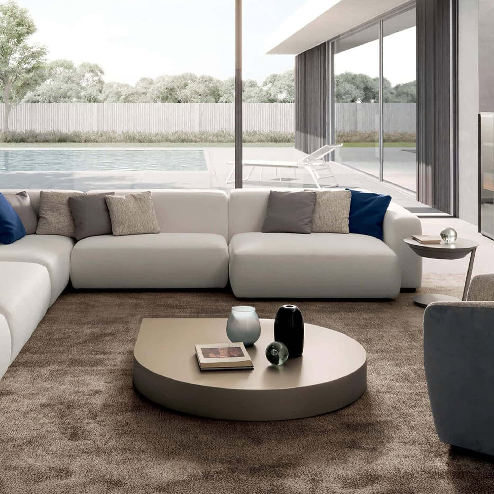 Presotto Drop Sculptural Coffee Table displayed in a modern living room with layered modular arrangement.