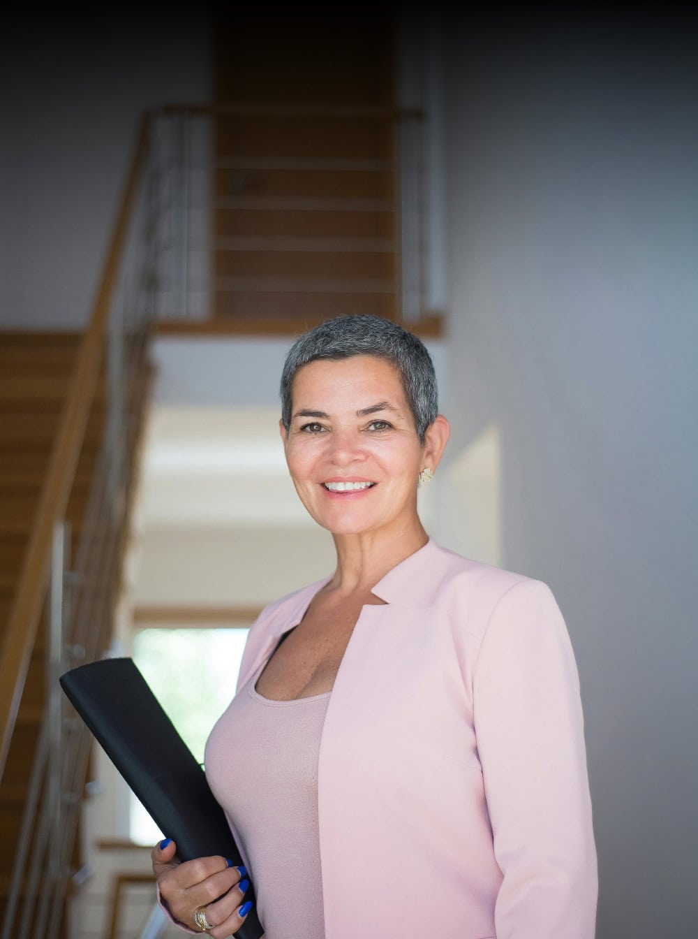 professional woman outside of house