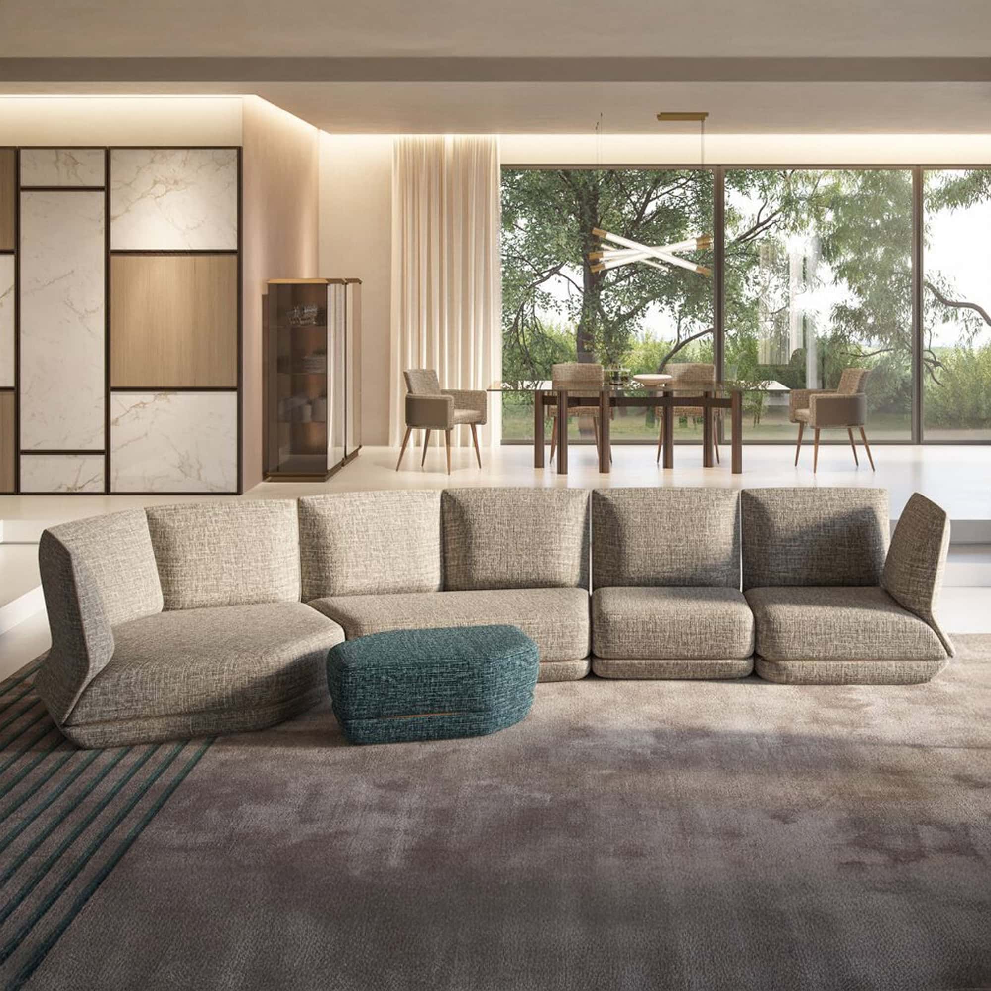 Reflex Orizzonte corner sofa in a spacious contemporary living room with large windows.
