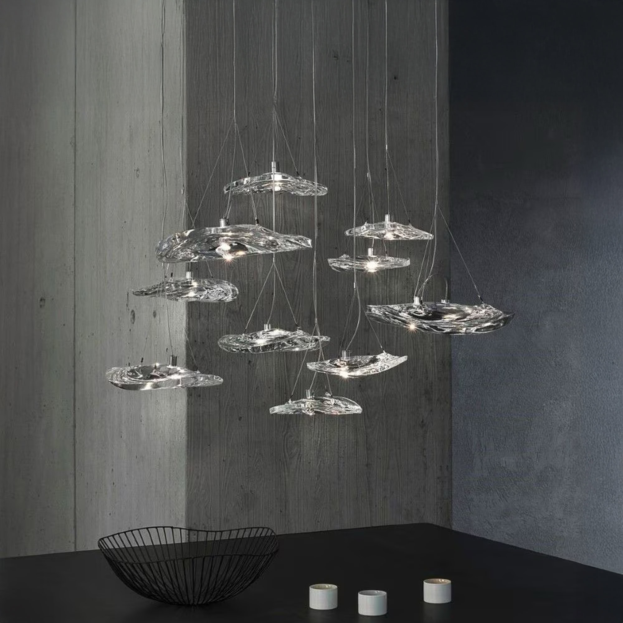 Terzani Manta Crystal Pendant Light arranged in a cascading cluster, showcasing shimmering crystal reflections.