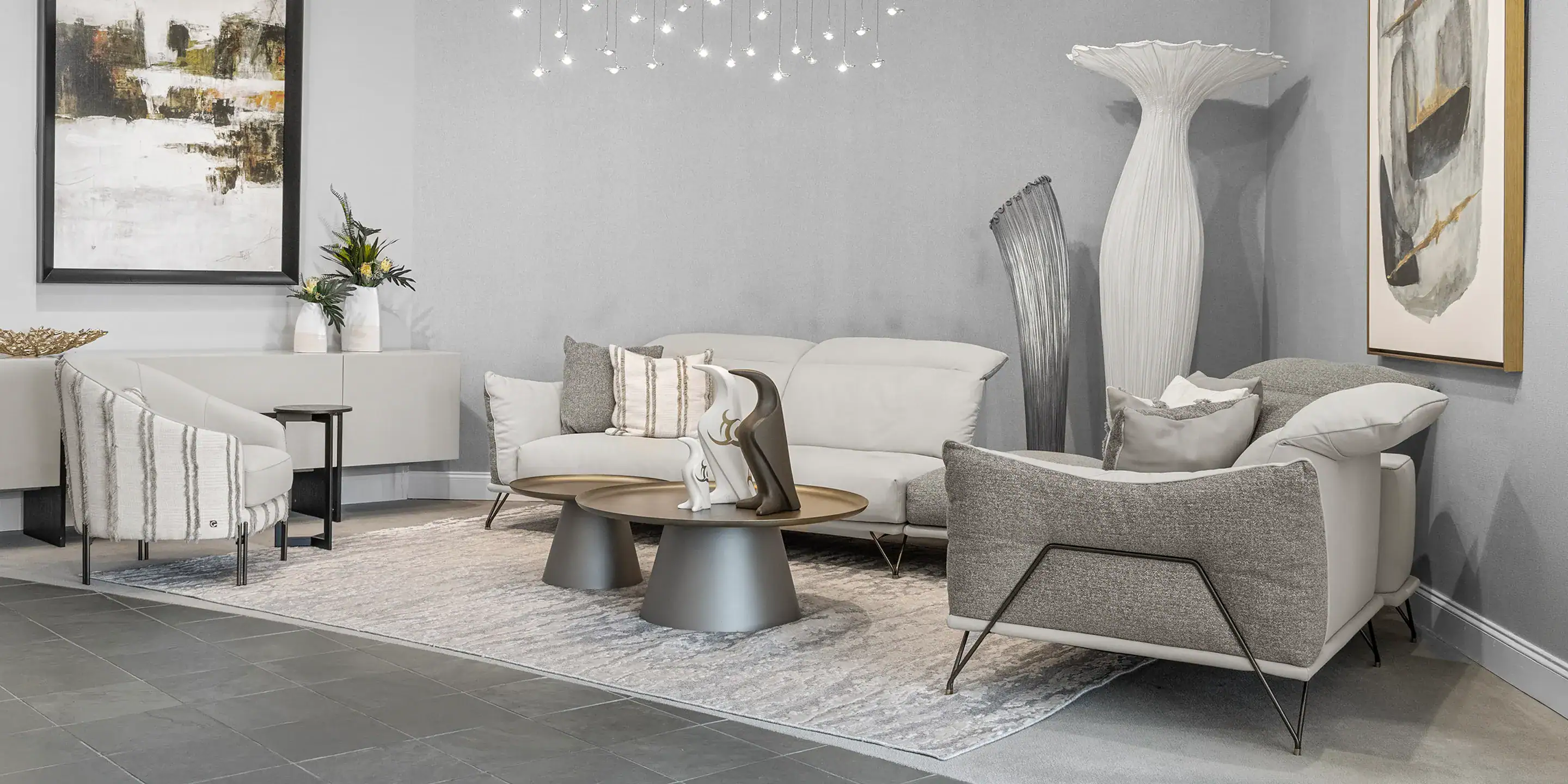 Elegant modern living room furniture with neutral tones and stylish decor from Sklar Furnishings.