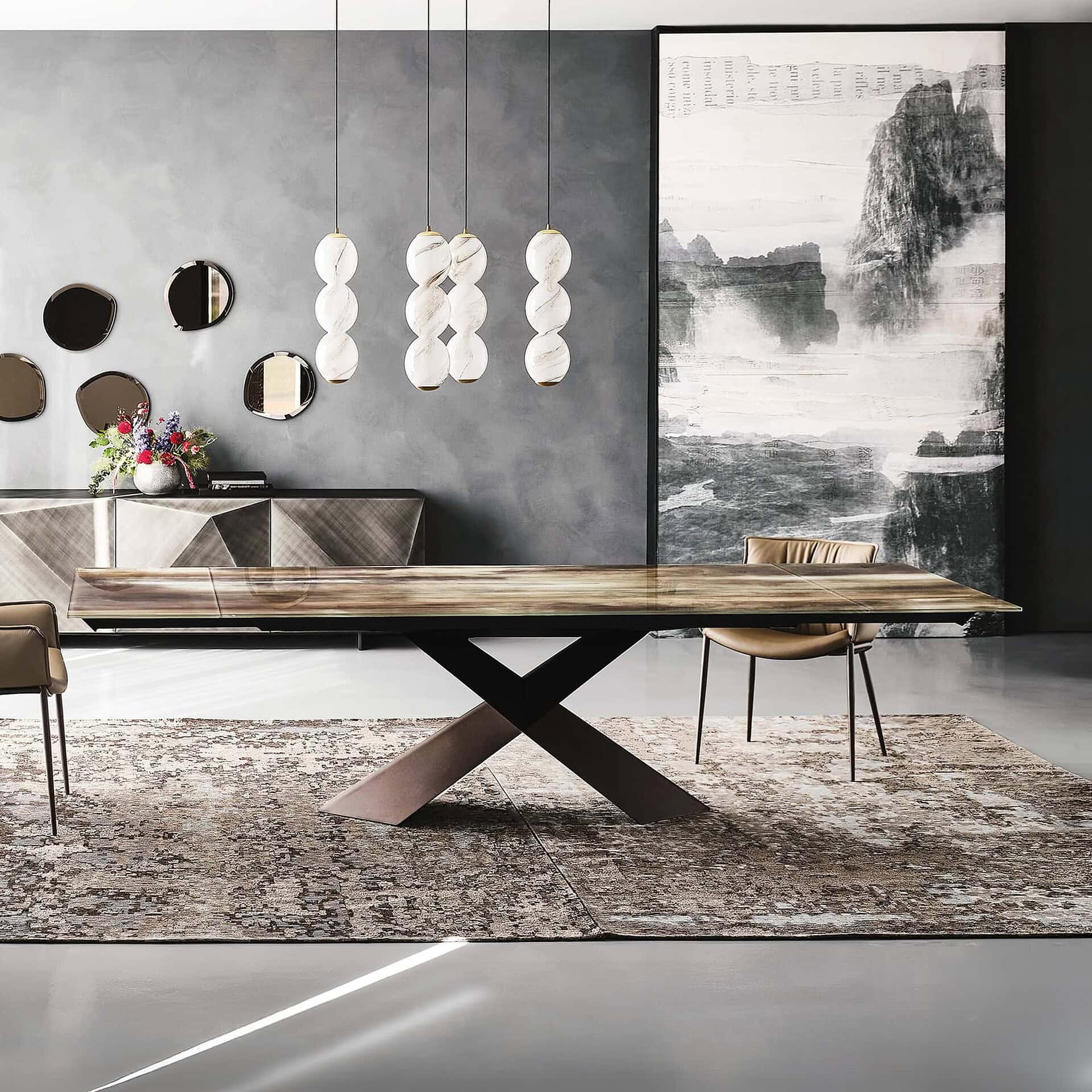 Elegant modern dining room with a wooden table, stylish chairs, and contemporary decor by Sklar Furnishings.