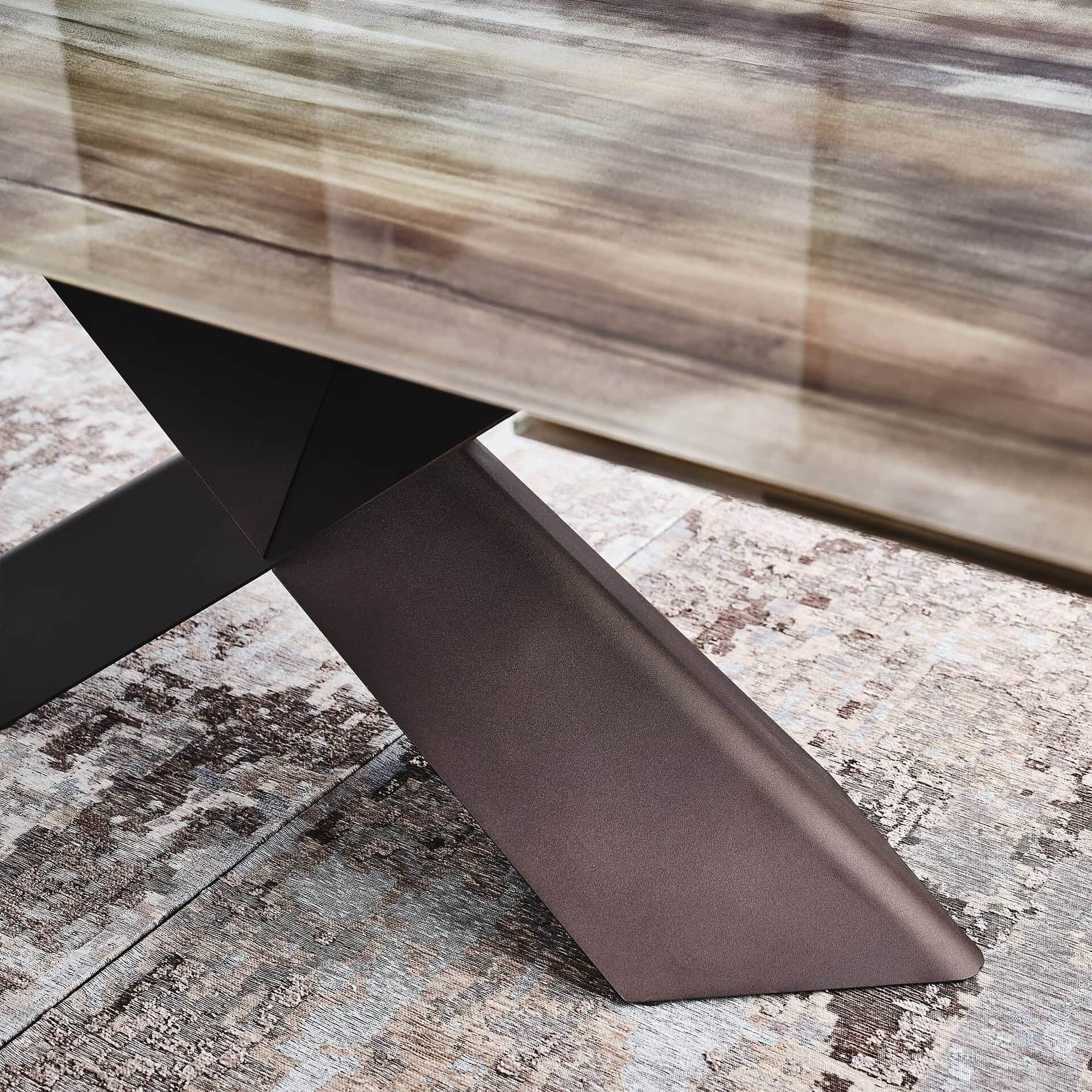 Sleek wooden and metal dining table with modern design from Sklar Furnishings.
