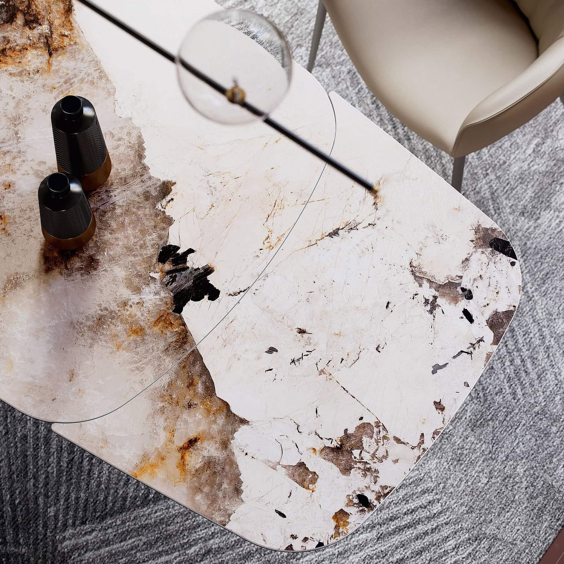 Luxurious marble dining table with unique veining, perfect for upscale interiors.