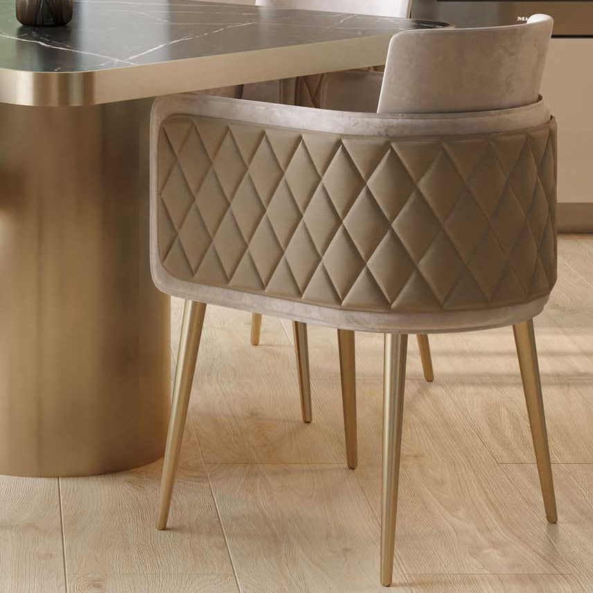 Luxurious beige upholstered dining chair with diamond quilting and wooden legs for elegant home decor.