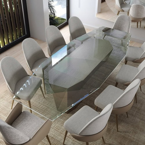 Glass dining table with a geometric base in a modern, bright, and stylish interior.