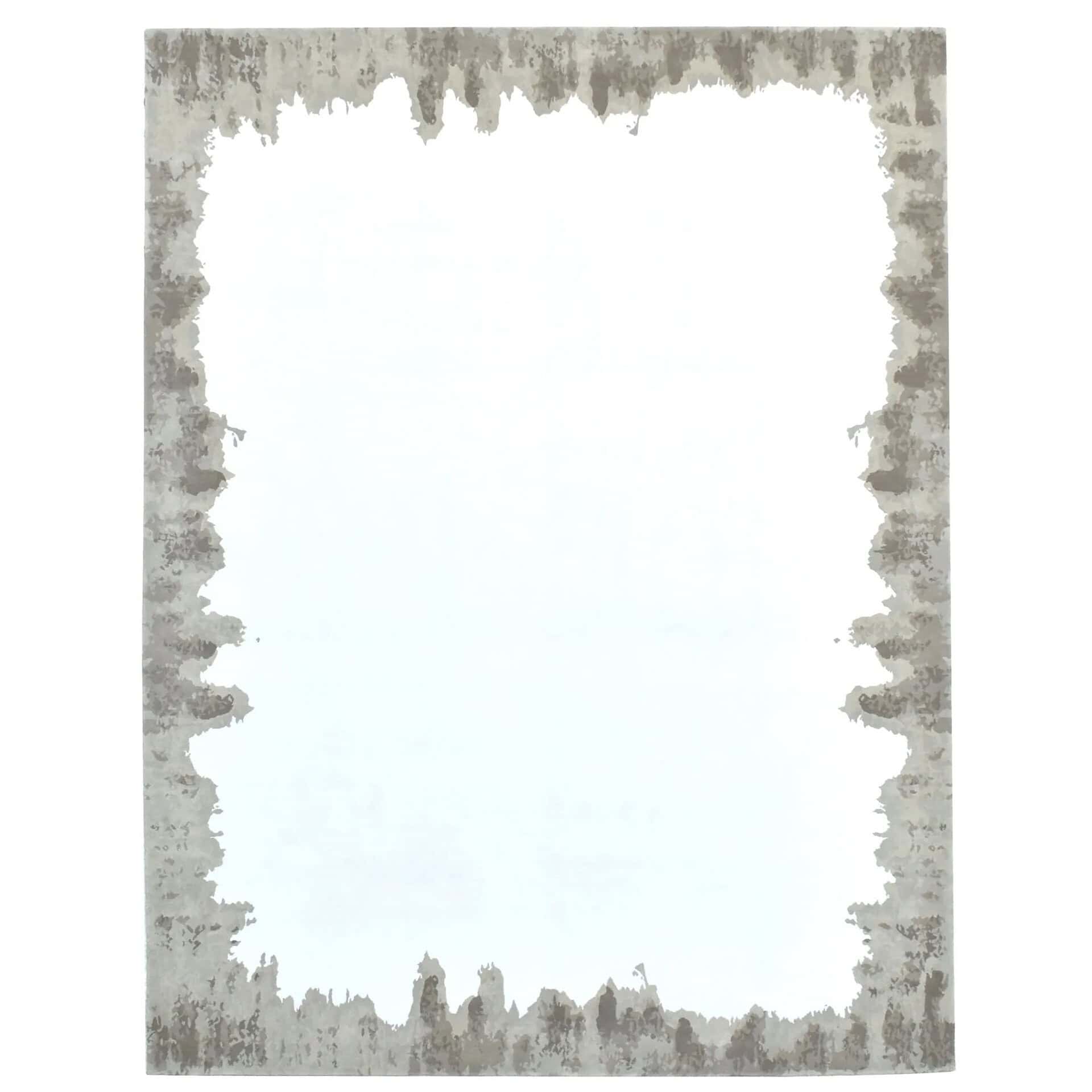 Modern gray and beige area rug with distressed edge design, perfect for contemporary living spaces.