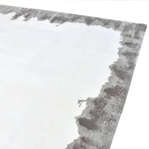 Modern abstract area rug with gray and white tones, perfect for contemporary living spaces.