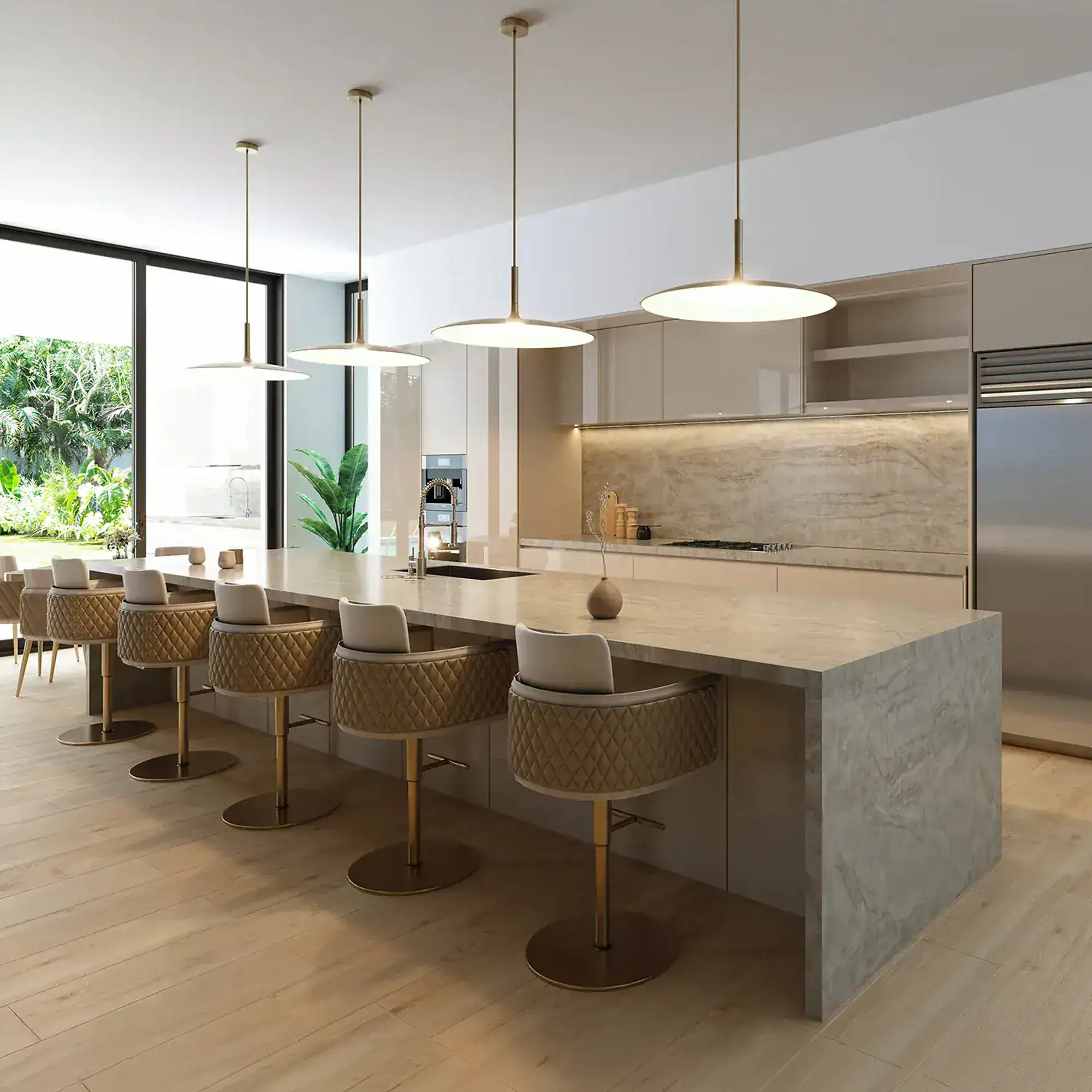 Modern kitchen with marble island and stylish gold-accented bar stools, abundant natural light.