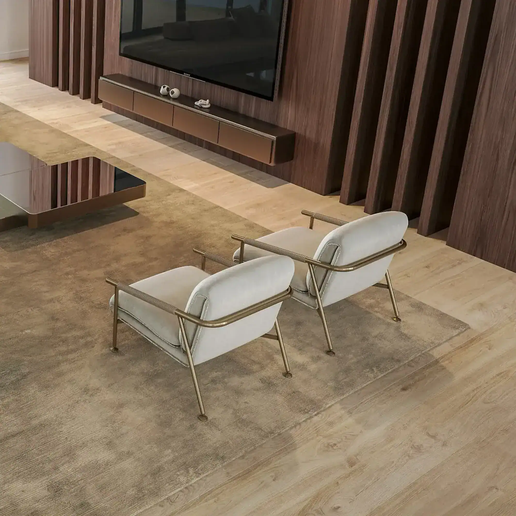 Modern living room with contemporary furniture and a sleek wall-mounted TV, featuring natural light and wood accents.