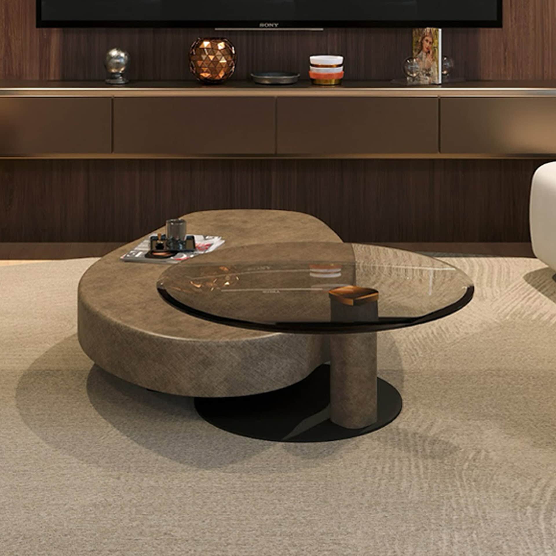 Modern glass and metal coffee table with decorative vases, perfect for contemporary living rooms.