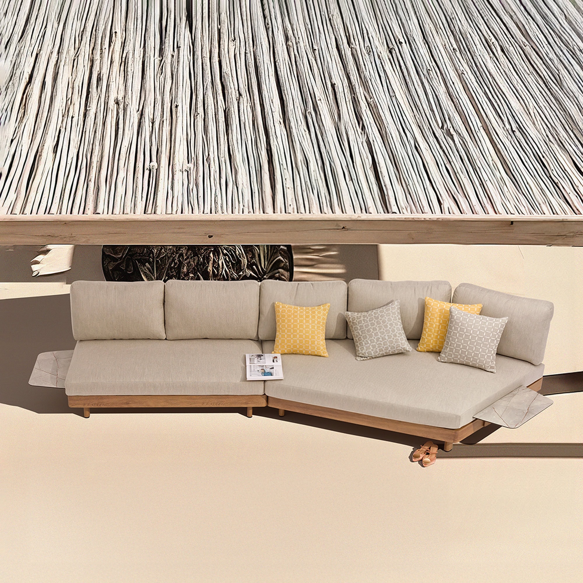 Luxury modern sectional sofa with beige upholstery and decorative pillows for contemporary living spaces.