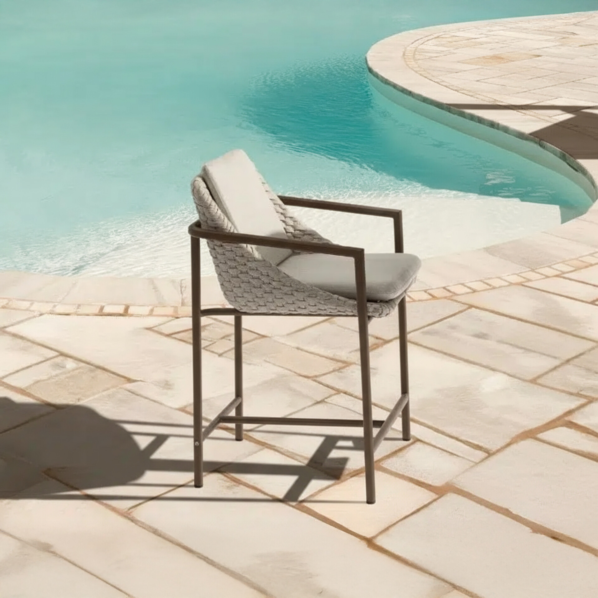 Polyurethane outdoor chair near swimming pool, Sklar Furnishings.