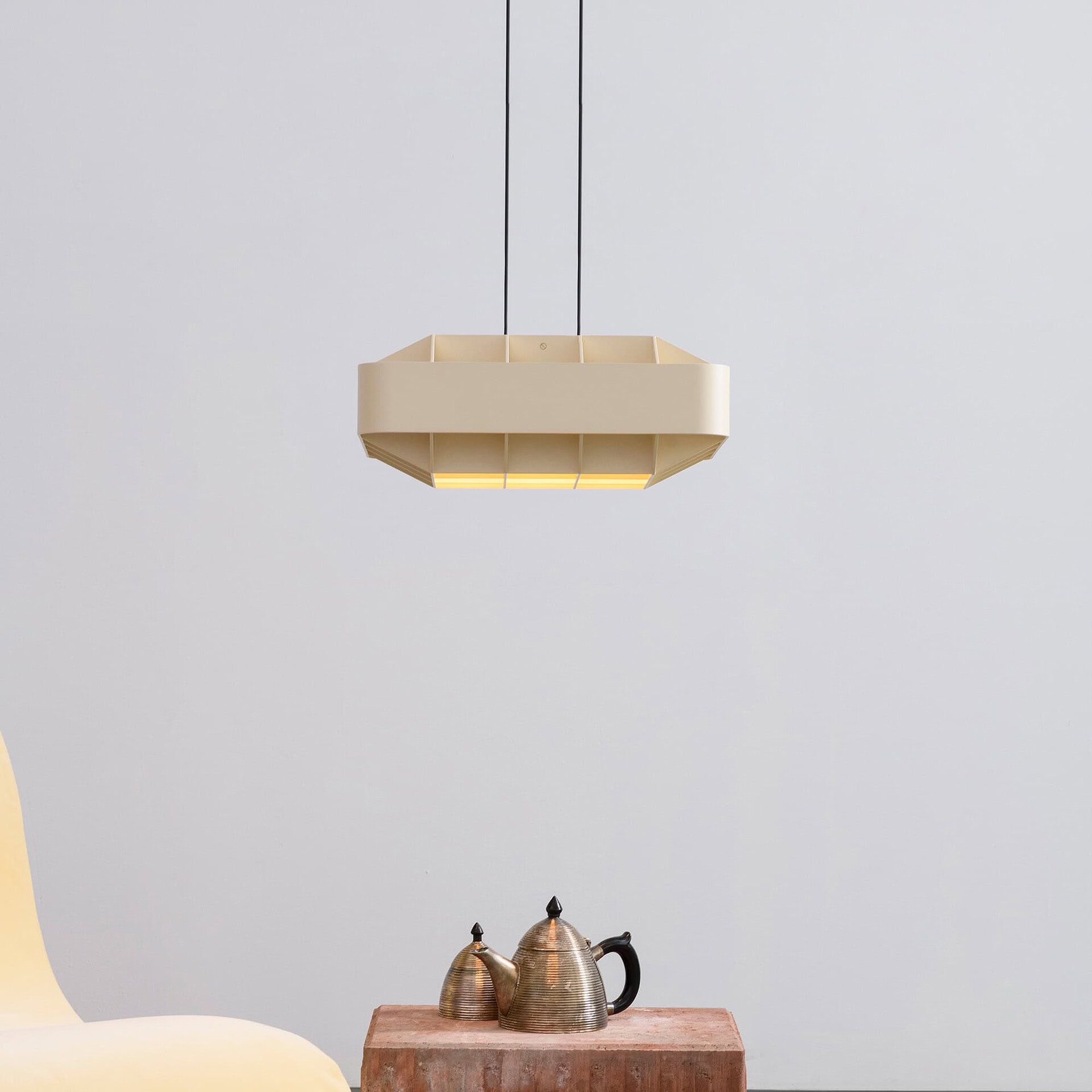 Modern beige pendant ceiling light with geometric design for contemporary home decor.