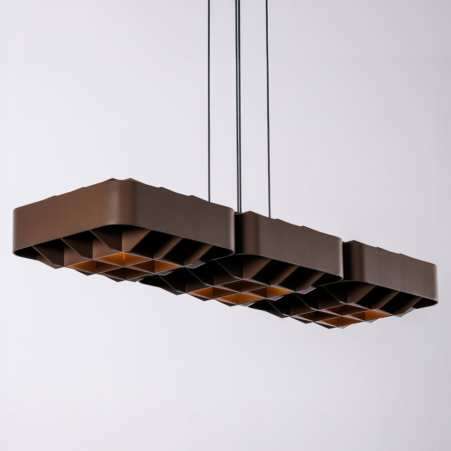 Modern brown geometric pendant lighting fixture from Sklar Furnishings.