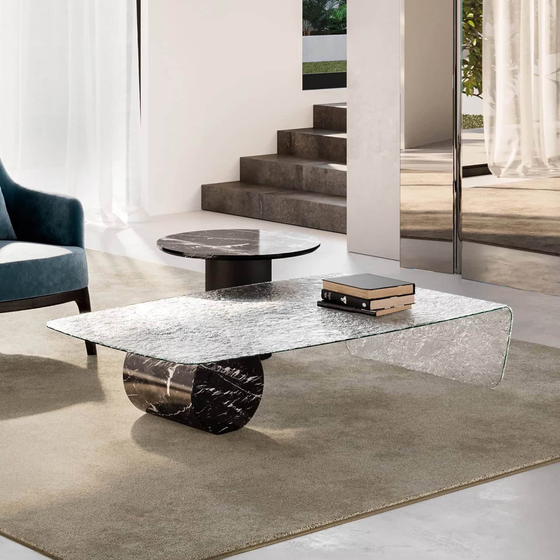 Luxurious modern living room with marble coffee table and stylish furnishings, showcasing Sklar Furnishings' contemporary design.