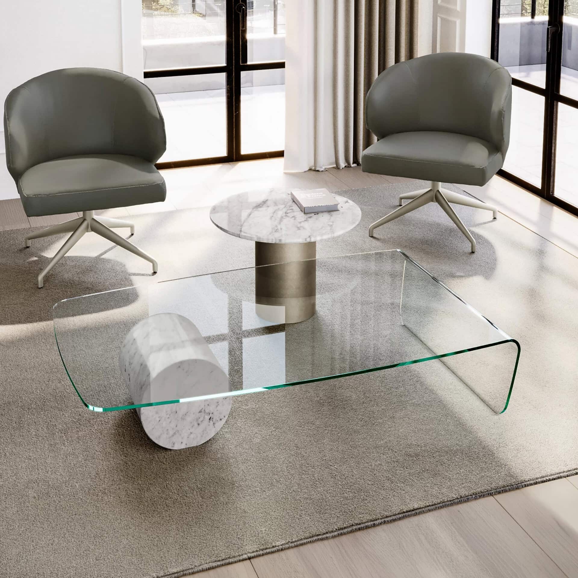 Elegant modern living room with glass and marble coffee tables, plush grey swivel chairs, and natural light.