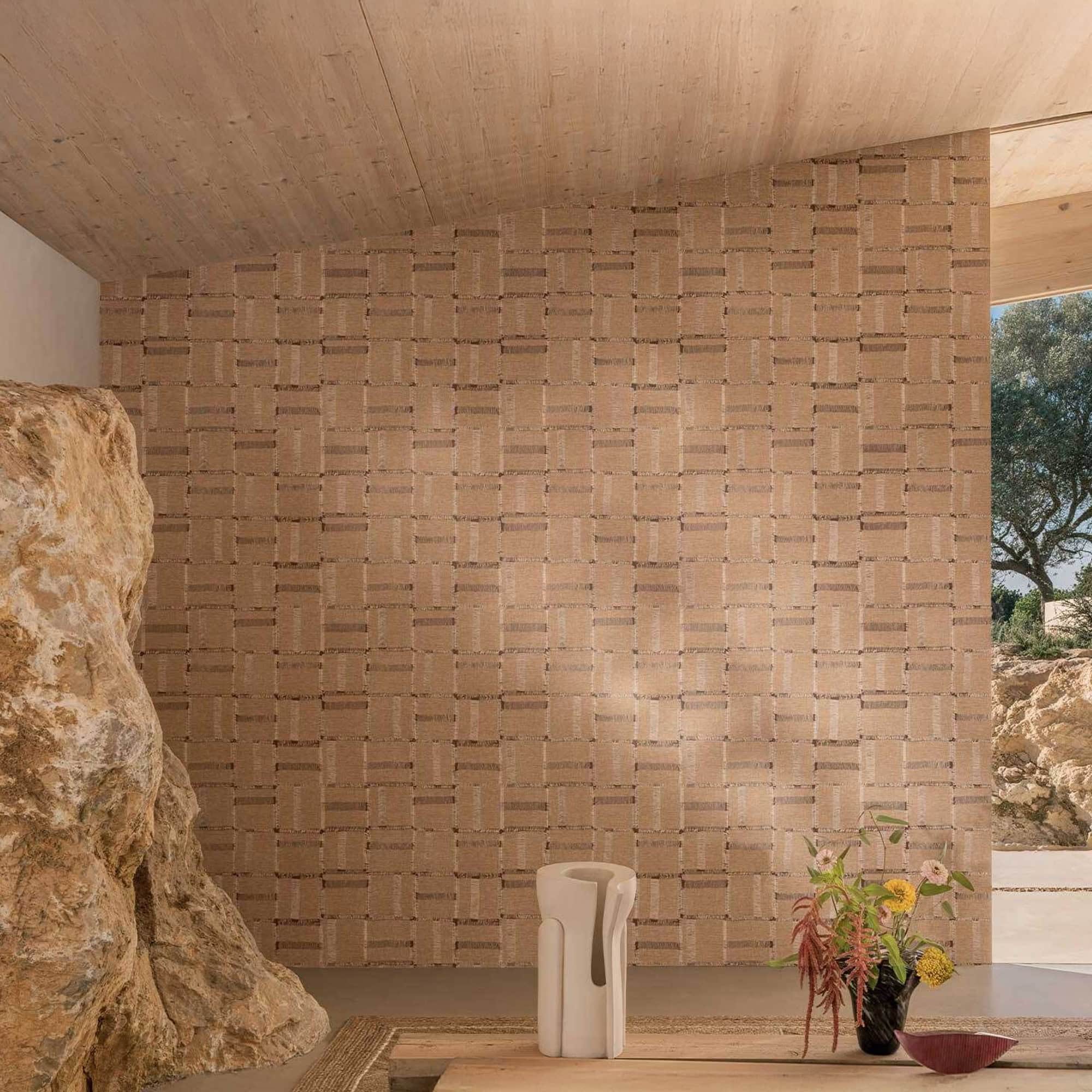 Textured Élitis Cybèle wallpaper in natural beige with subtle fiber detailing, creating a soft woven effect.