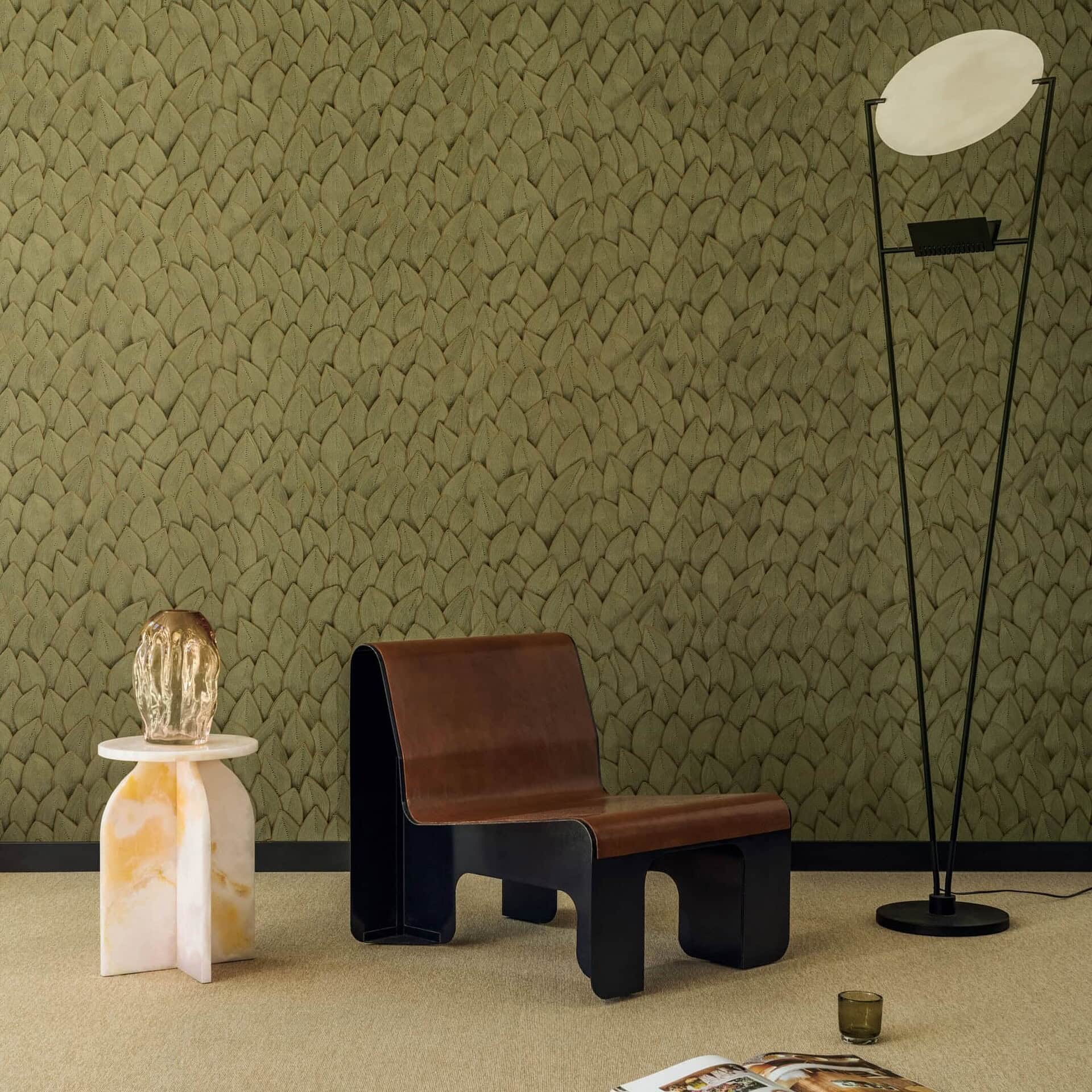 Sleek modern living room with contemporary furniture and textured wallpaper in green tones.