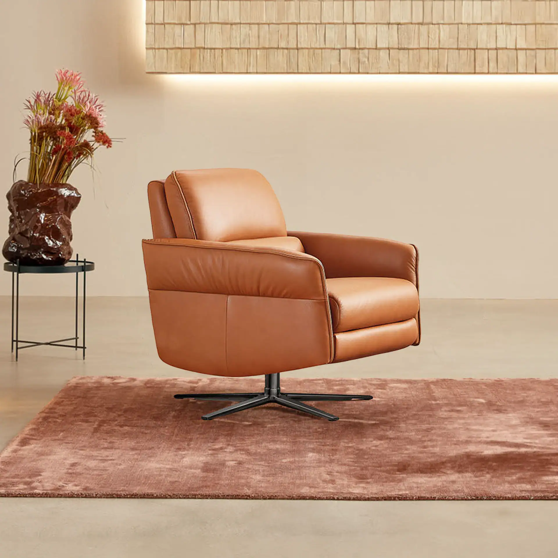 Aura Swivel Recliner Chair with plush leather upholstery and 360-degree rotation. Perfect for stylis.