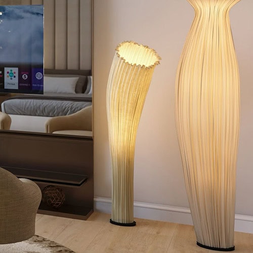 Sculptural gold wooden vase by Sklar Furnishings for modern home decor.