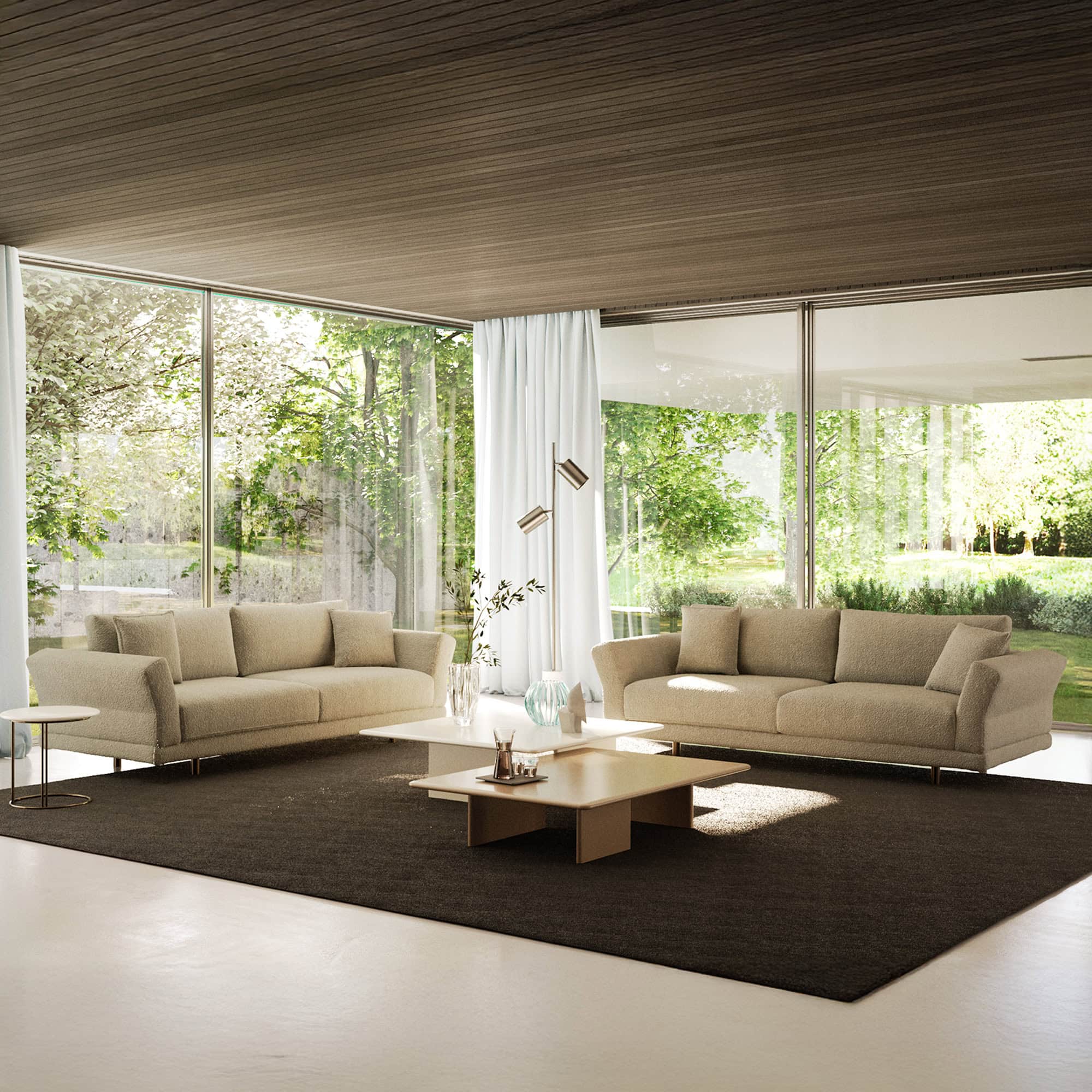Contemporary living room with modern sofas, large windows, and natural light, showcasing minimalist furniture design.