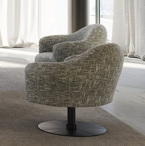 Comfortable modern swivel armchair with textured fabric, perfect for office or lounge settings.