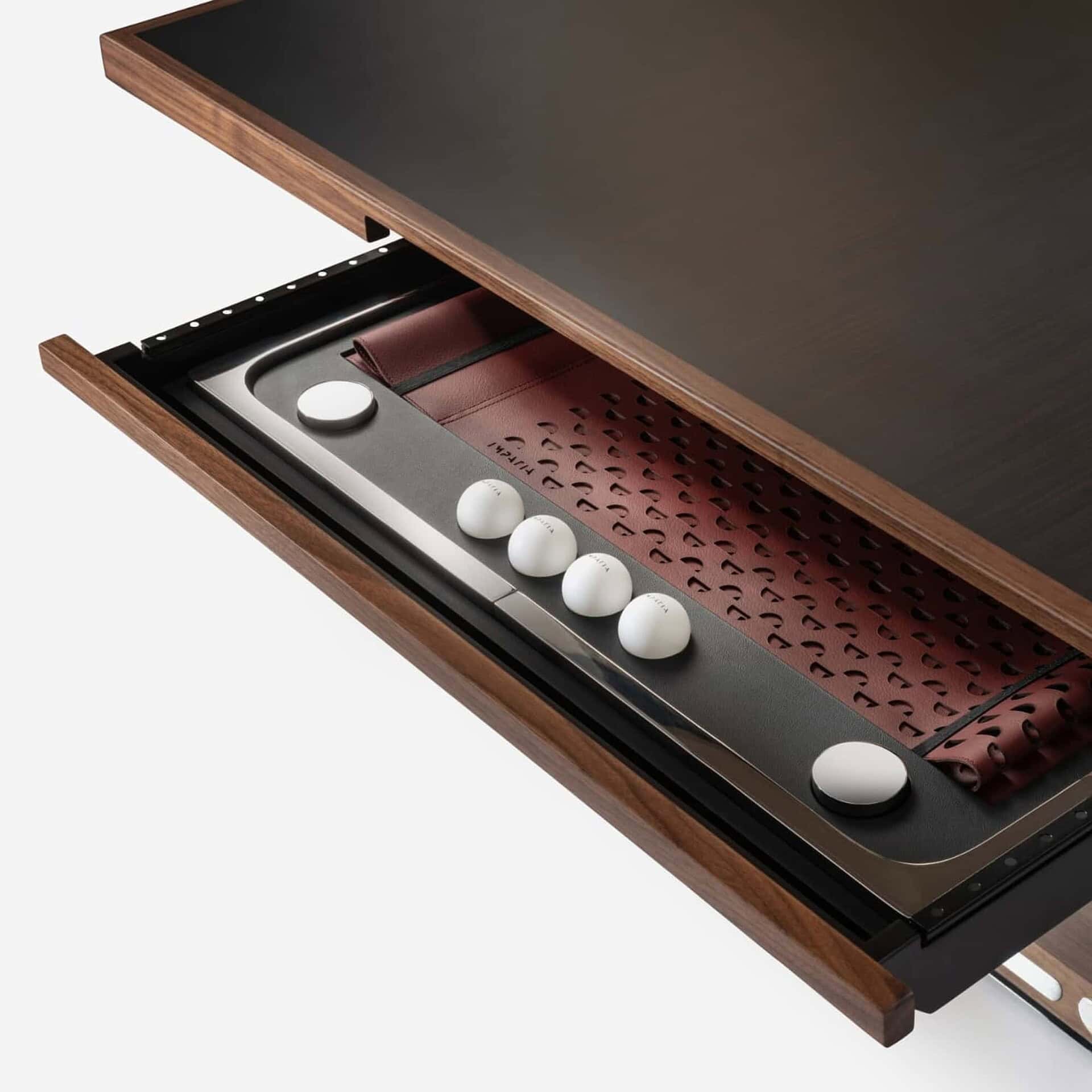 Puzzle table built-in game tray with chess pieces in drawer, innovative furniture design.