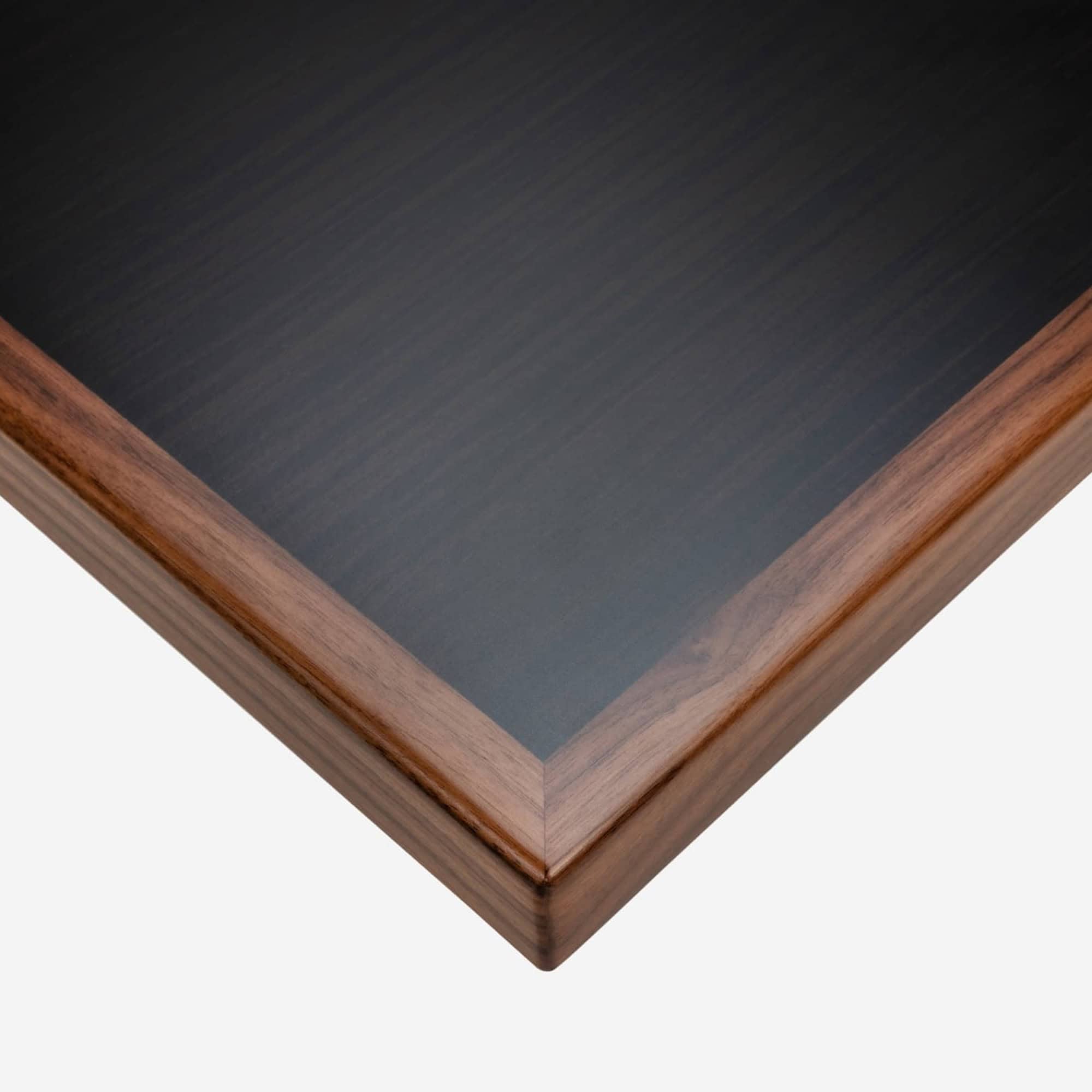 Sleek walnut and black glass dining table with modern design, perfect for contemporary home dining spaces.