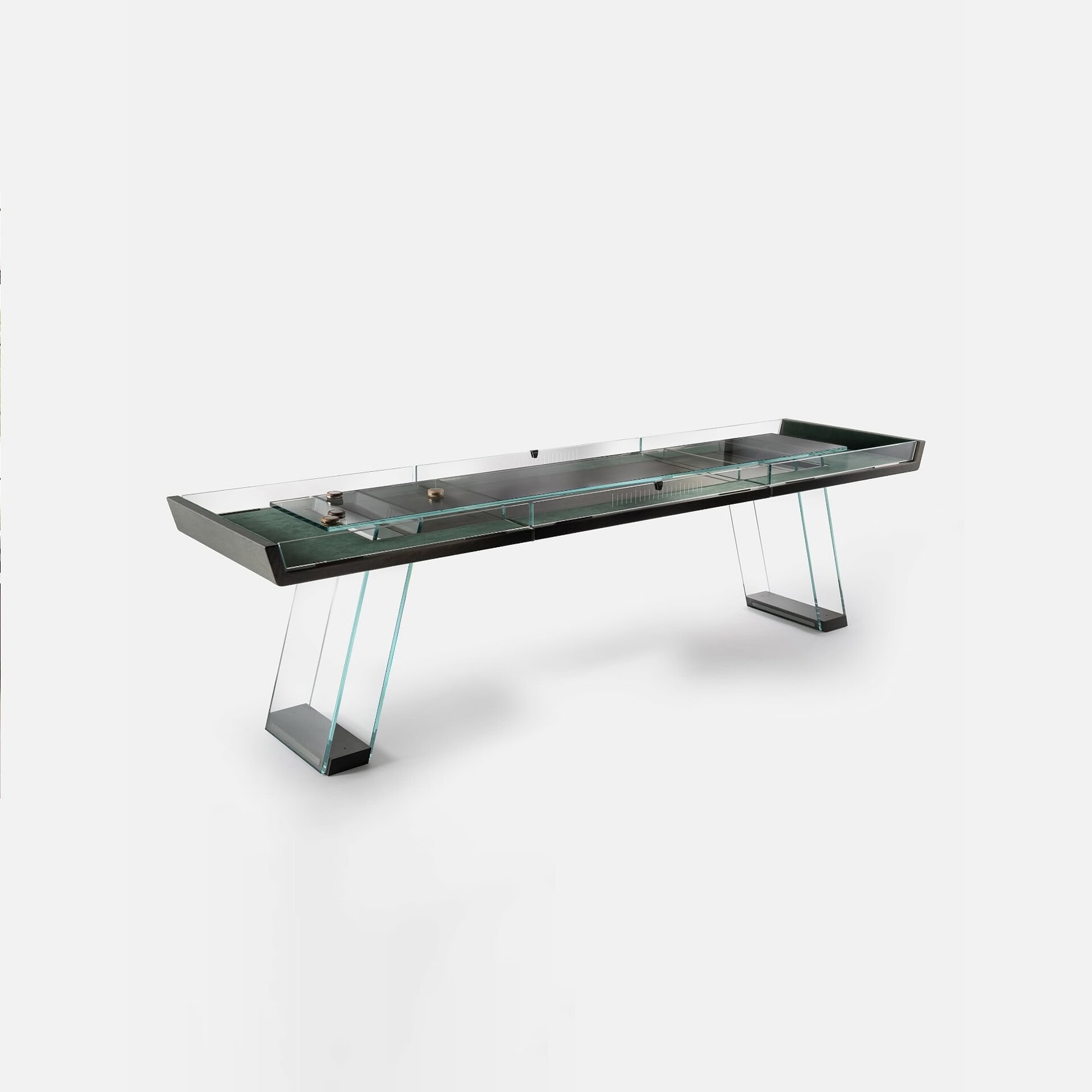 Sculptural modern glass and wood display table with sleek metal supports.