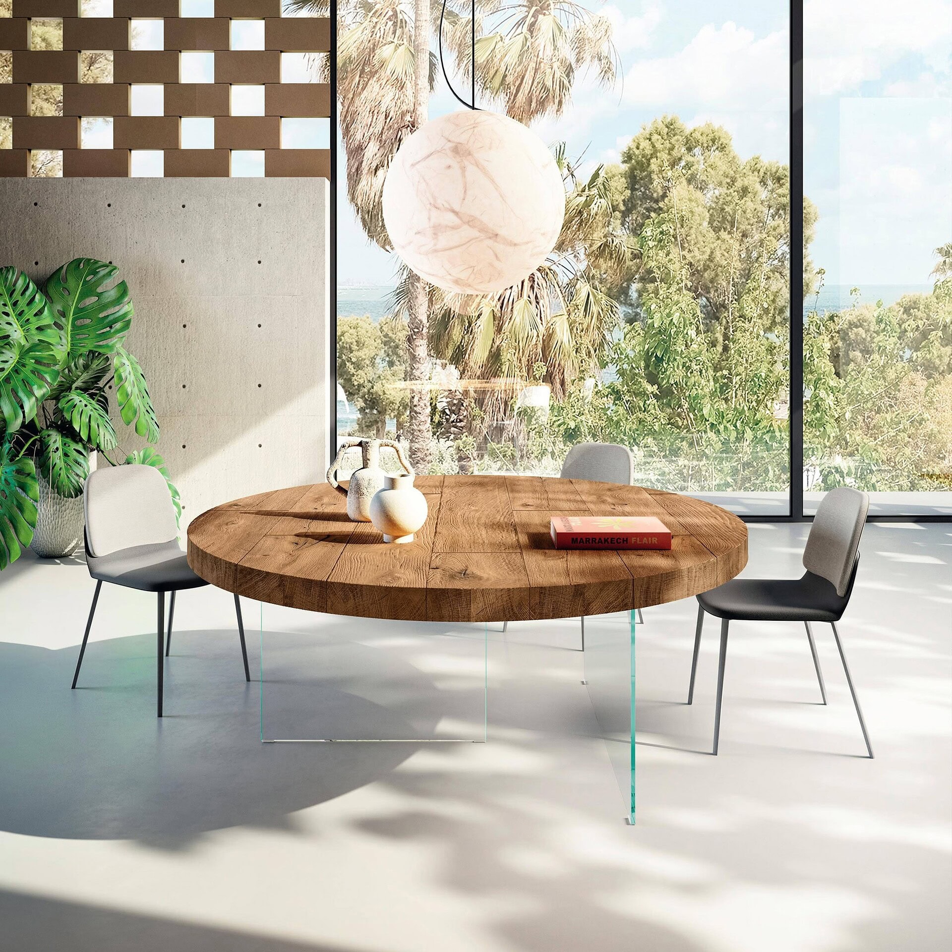 Elegant round wooden dining table with modern chairs and contemporary decor in bright, stylish interior.