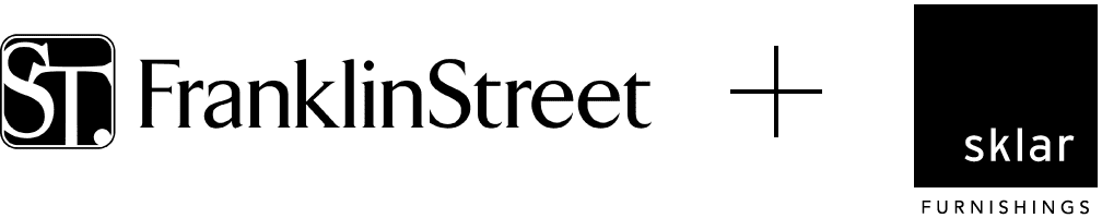 Elegant custom hardwood dining table with modern design from Sklar Furnishings.