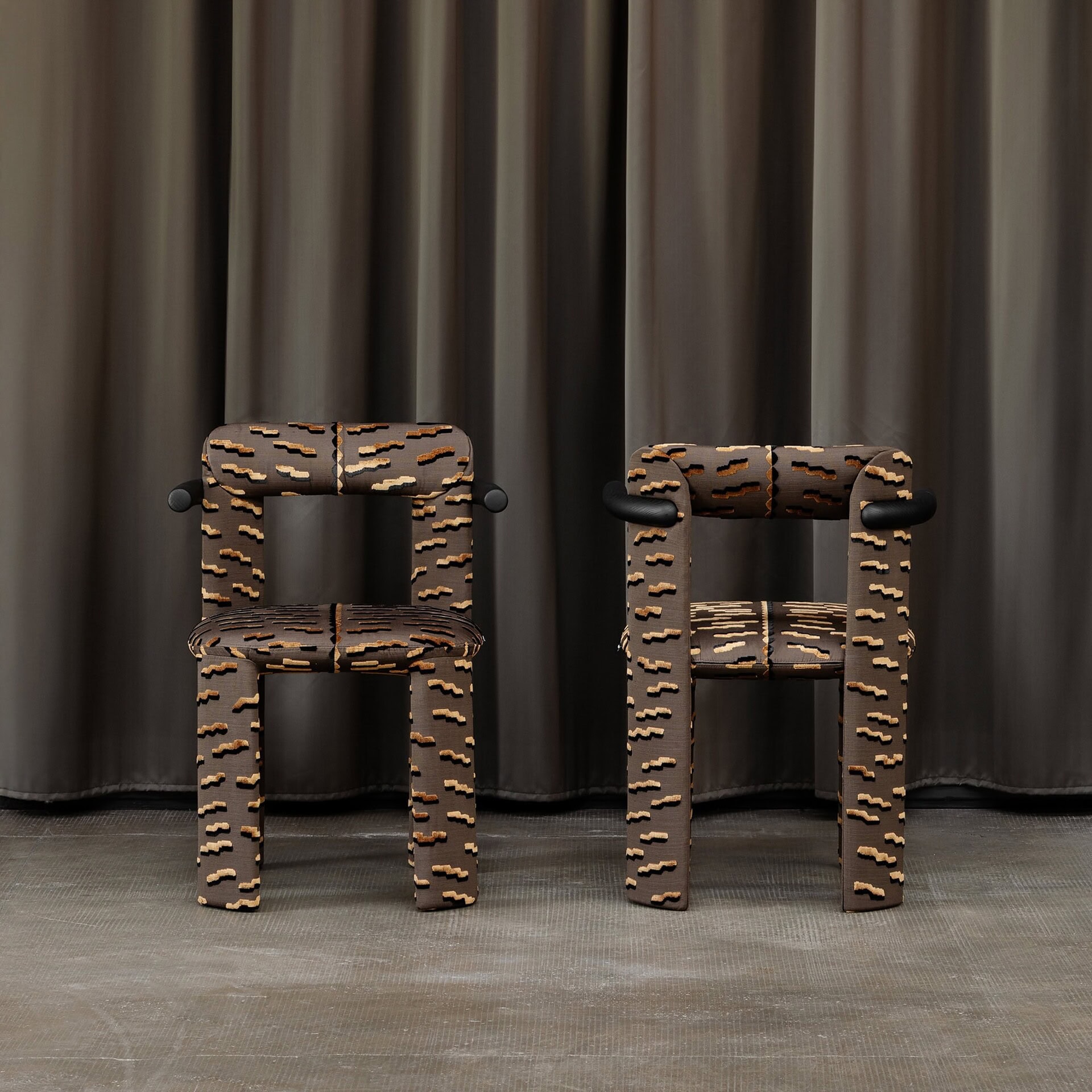 Stylish patterned accent chairs by Sklar Furnishings with modern design and bold fabric looks.