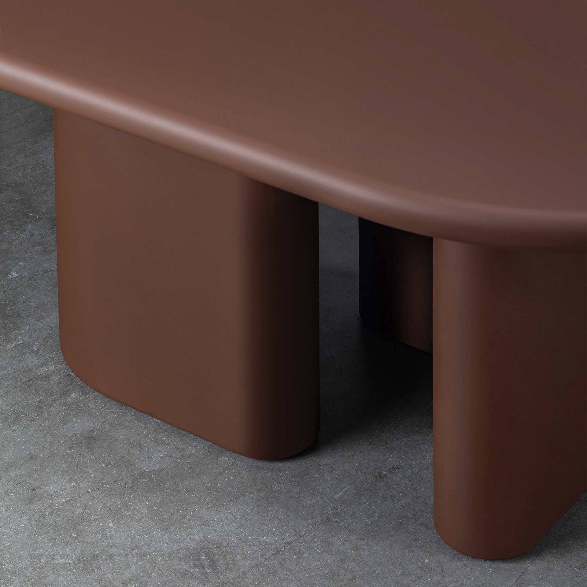 Sleek modern brown dining table with rounded edges and sturdy base, stylish furniture for contemporary dining spaces.