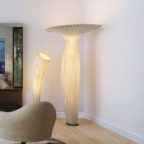 Elegant tall decorative vase with floral top, modern design by Sklar Furnishings.