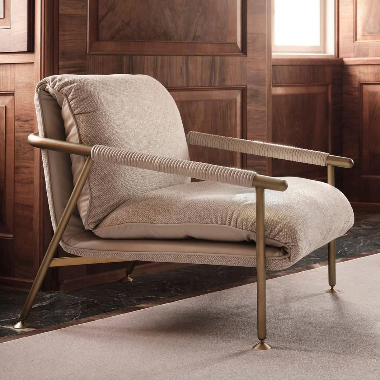 1. Modern beige lounge chair with metallic armrests and wood-paneled walls.