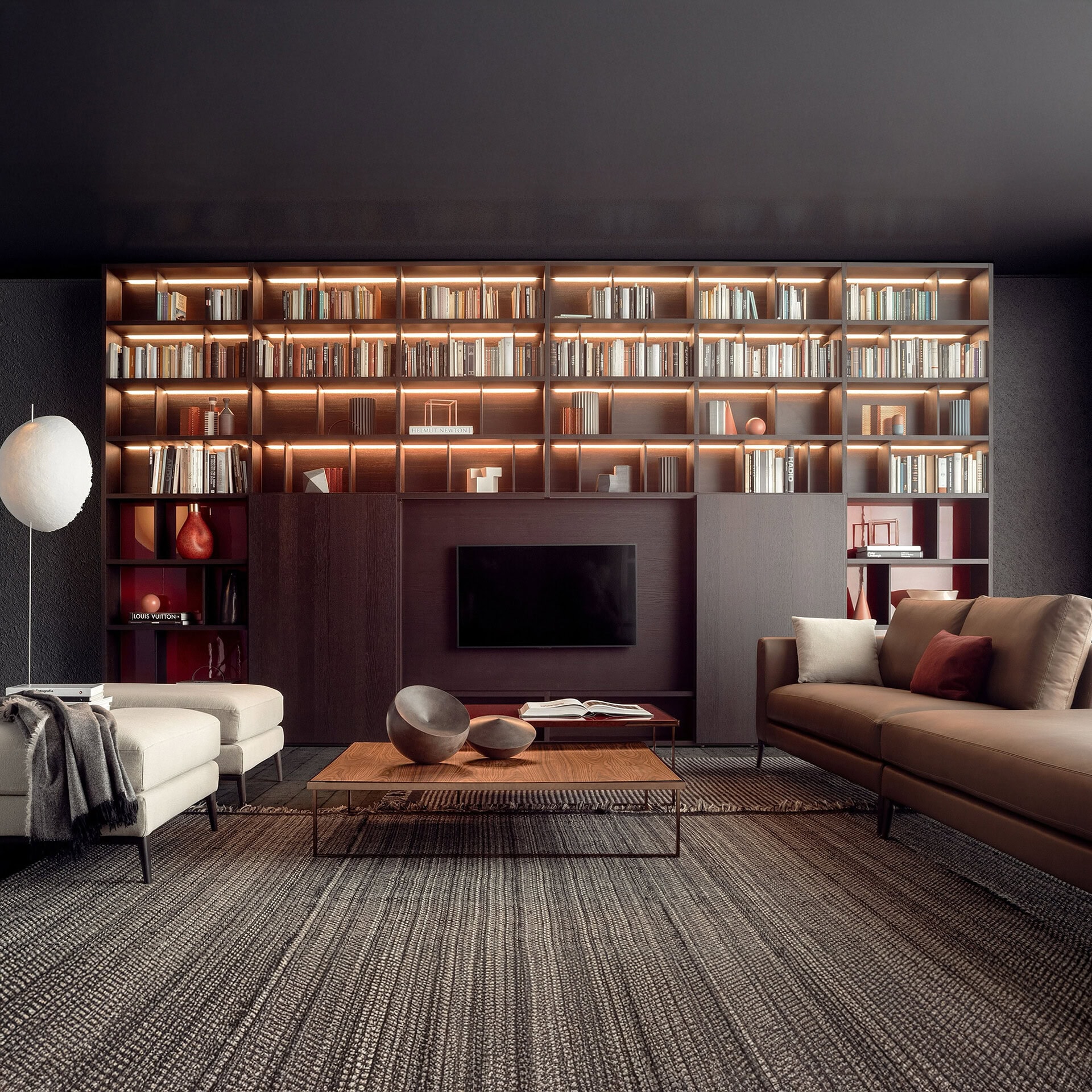 Spacious living room featuring a built-in wooden bookshelf, comfortable sofas, and stylish decor.