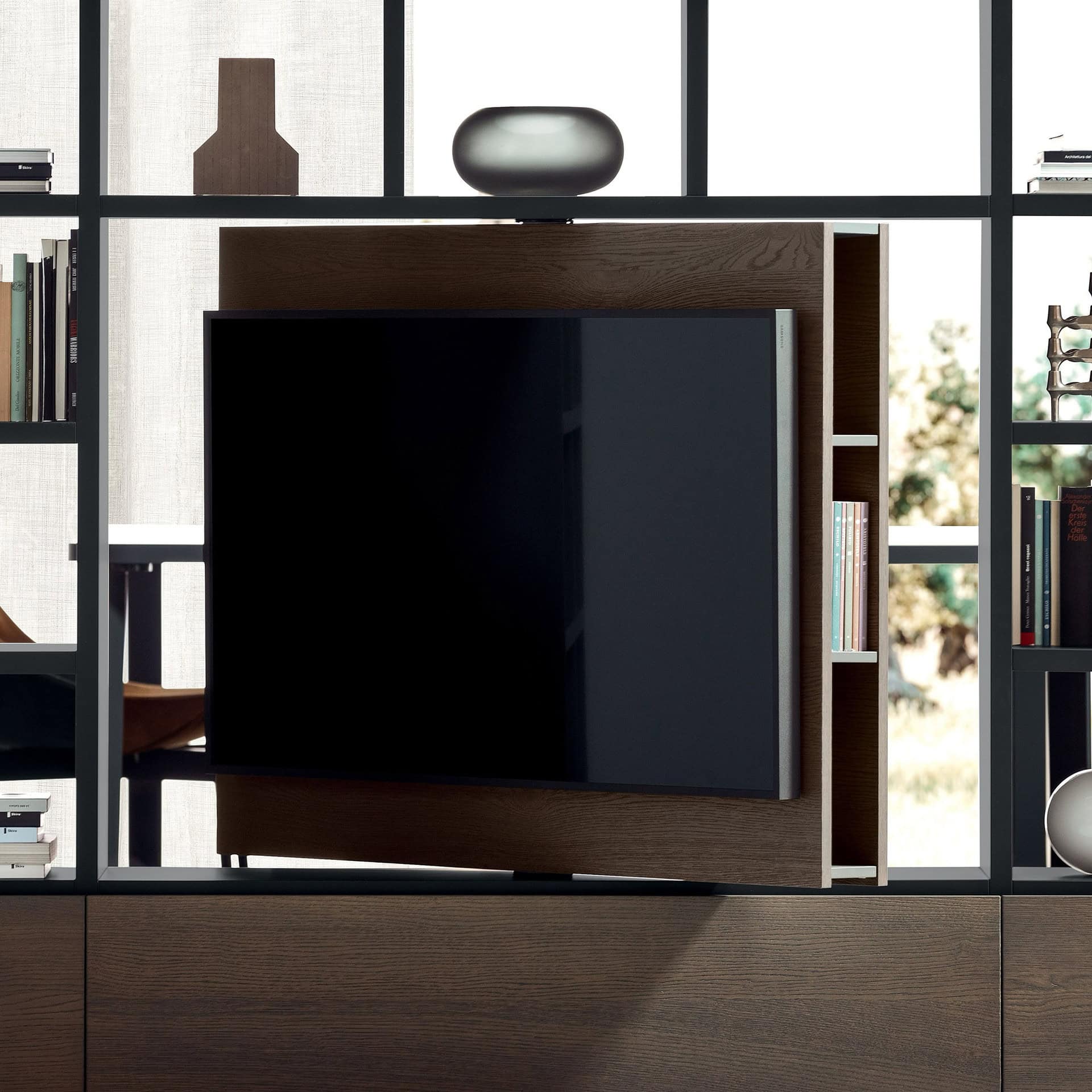 Stylish wooden TV console with open shelving and decorative accessories, perfect for contemporary living rooms.
