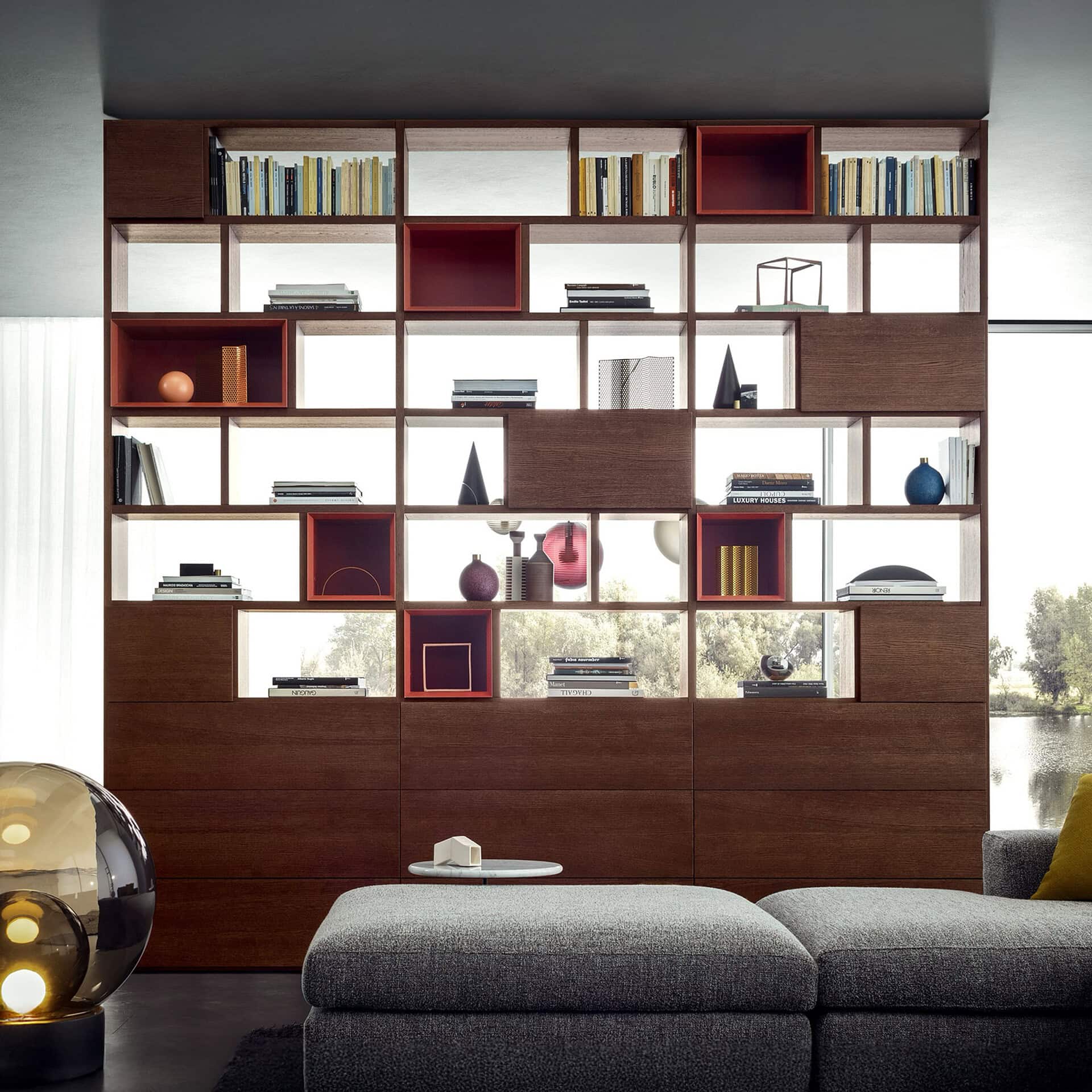 Versatile wooden shelving unit with textured finishes and vibrant storage cubes, ideal for modern home decor.