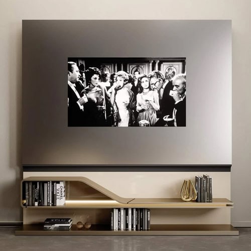 Elegant modern living room with upgraded entertainment wall featuring sleek TV setup and stylish shelving from Sklar Furnishings.