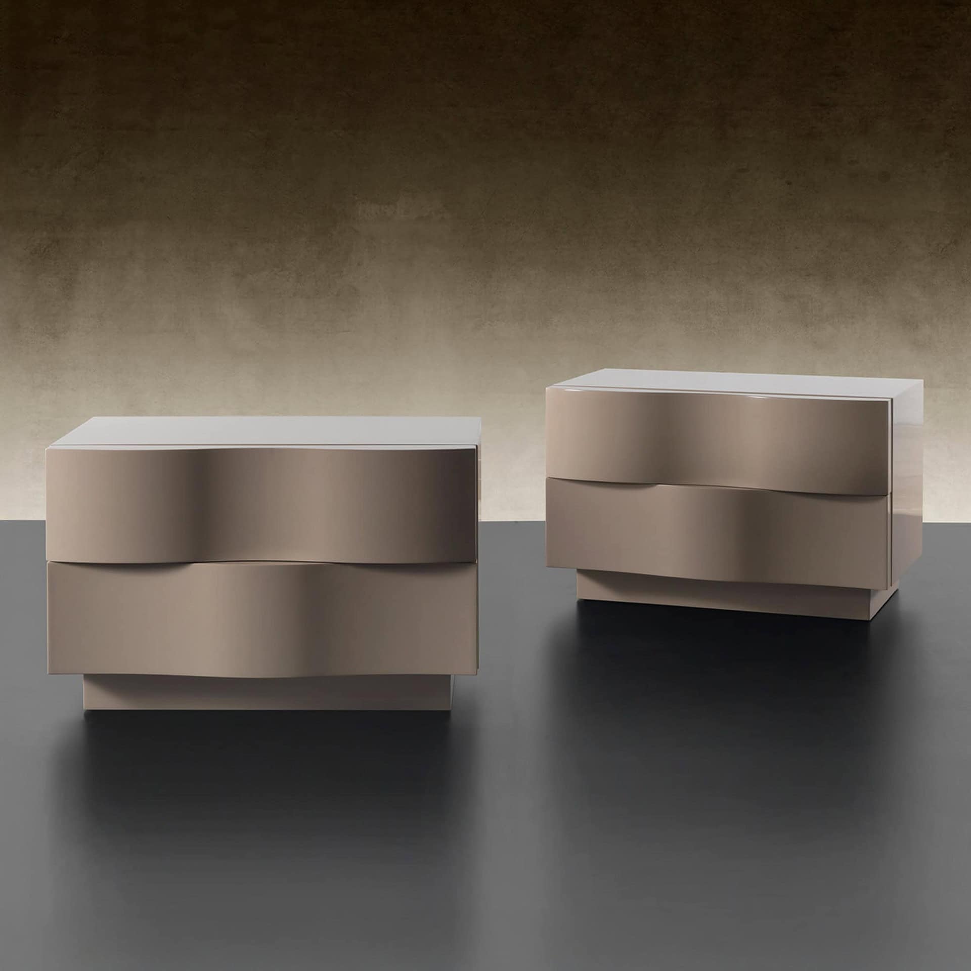 Contemporary beige nightstands with curved drawer fronts and a sleek modern design.
