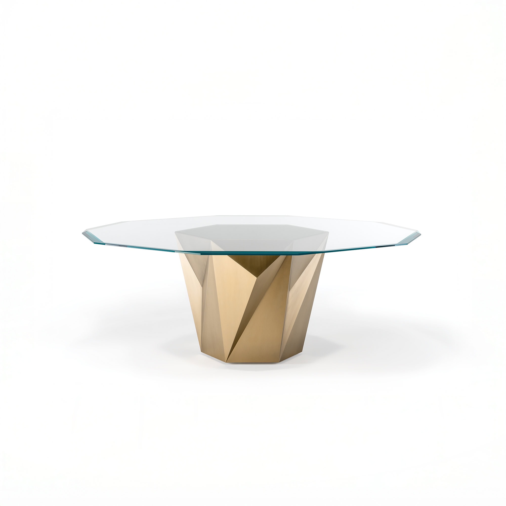 Elegant glass-top dining table with geometric gold base - modern luxury furniture.