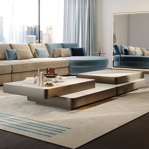 Stylish modern sofa with blue accents in a contemporary living room setup.