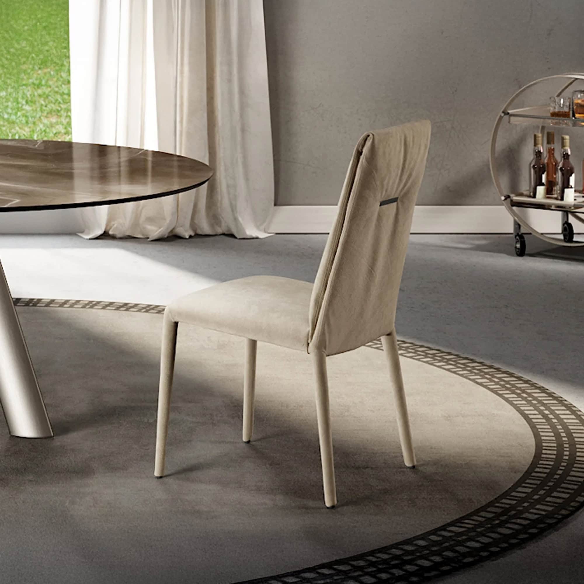 Elegant beige dining chair for contemporary home interiors.