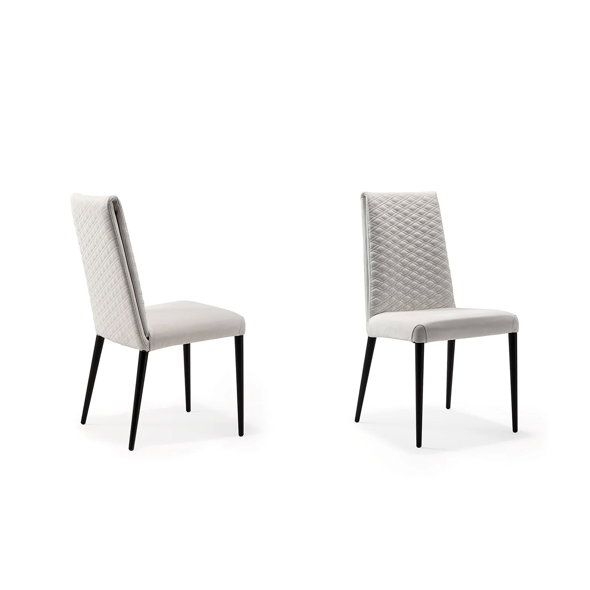 Elegant upholstered dining chairs with quilted and plain fabric options, perfect for contemporary di.